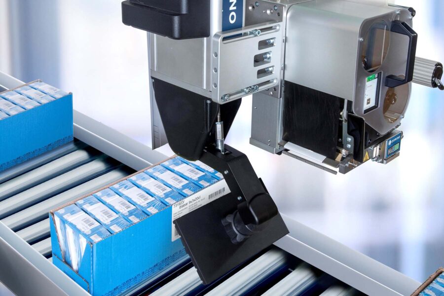 Mx350i-SP 4 Domino Print & Apply - Mx350i-SP Labelling tray of juice